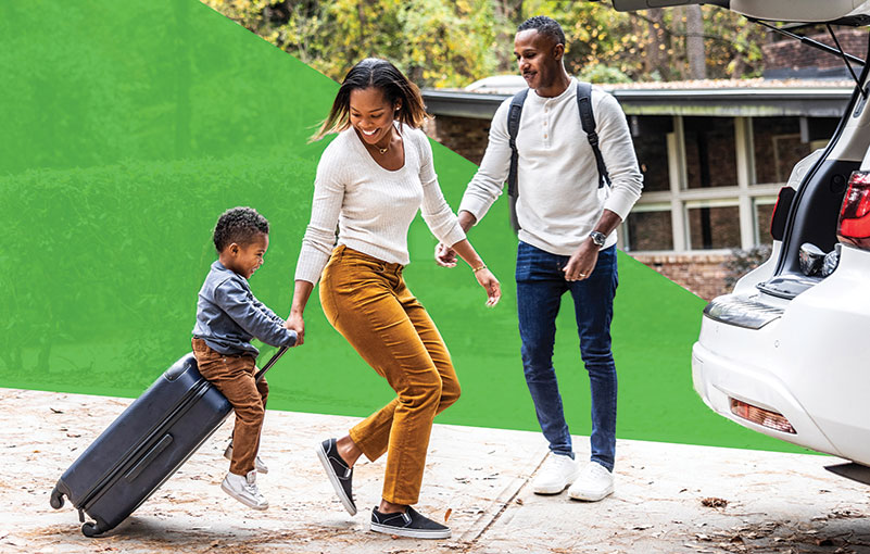 Family loading a car for travel, illustrating what life could look like with consolidated debt and more financial flexibility