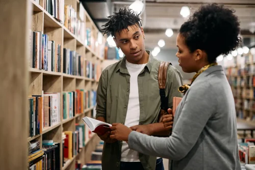lady in bookstore with customer