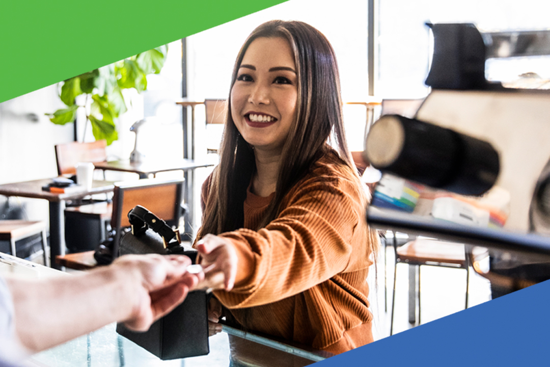 lady giving card for payment at counter
